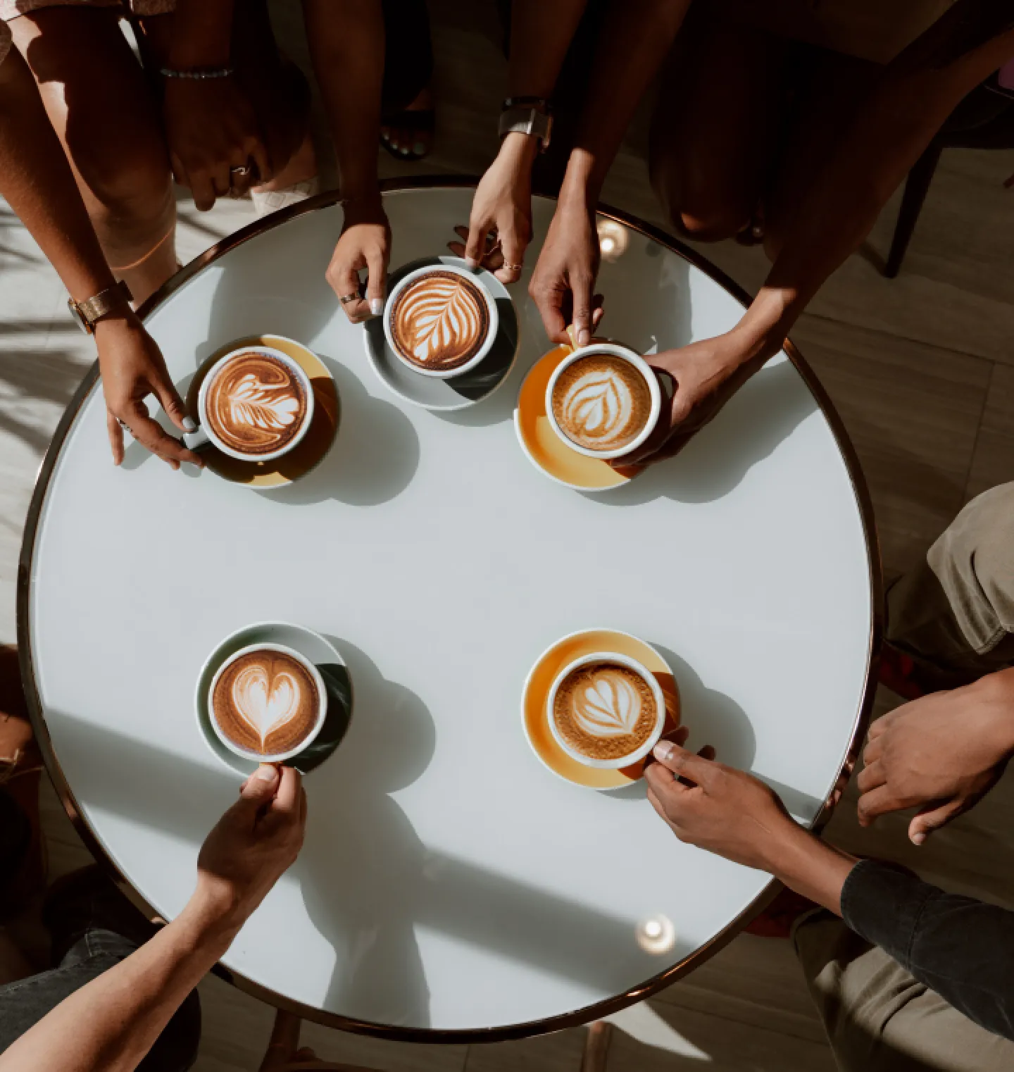 Coffee cups and saucers on a table in a professional office setting